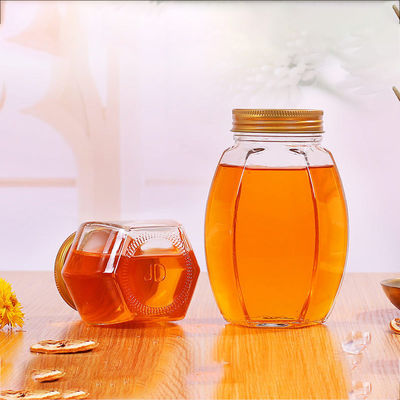 금속 뚜껑 유리제 꿀 단지 육각형 모양 재상할 수 있는 음식 저장 그릇 협력 업체