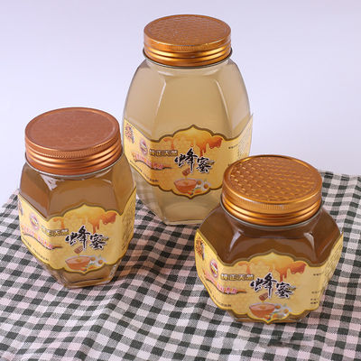 금속 뚜껑 유리제 꿀 단지 육각형 모양 재상할 수 있는 음식 저장 그릇 협력 업체