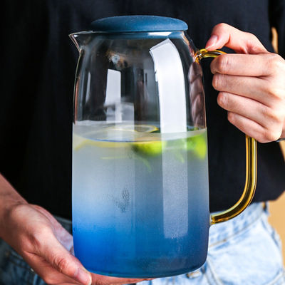 얼린 물 음료를 위한 2개의 컵을 가진 착색된 1550ml 유리제 물 투수 세트 협력 업체